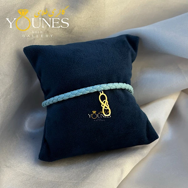 دستبند چرم آبی قلب بینهایت طلا